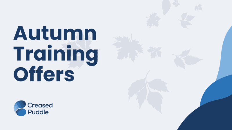 Graphic with dark blue text reading 'Autumn Training Offers' alongside the Creased Puddle logo. Background features light grey falling leaves and abstract blue curved shapes in the bottom right corner.
